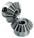 Close-up of metallic bevel gears interlocking and rotating