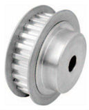 Close-up of metal timing belt pulleys used in machinery