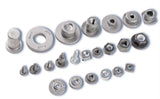 Close-up of welding bolts and nuts on metal surface