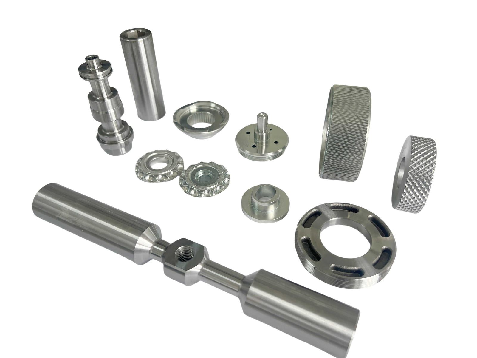 High precision CNC machined industrial components made from stainless steel, aluminum, and zirconia ceramic materials